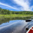 Canoeing on pond